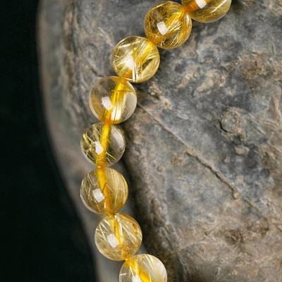 Vòng tay đá thạch anh tóc vàng charm mèo thần tài mệnh thủy, kim - Ngọc Quý Gemstones