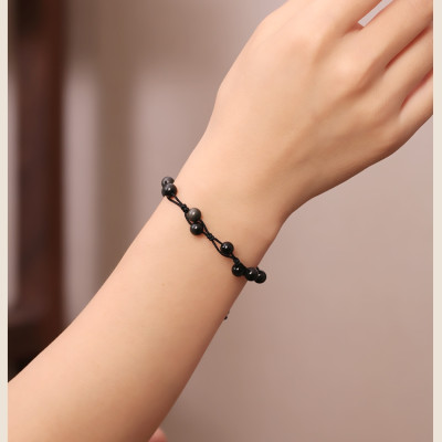 Vòng tay Nữ phong thủy gắn hạt đá huyền thạch kết dây thủ công