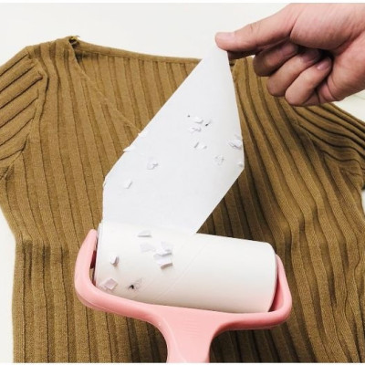 Cây lăn bụi quần áo và nhặt lông chó mèo