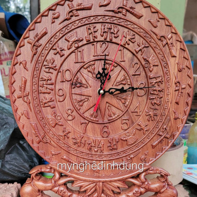 Tranh đồng hồ khắc trống đồng đông sơn trang trí phòng khách bằng gỗ hương đá kt mặt tròn 27×3×37cm  