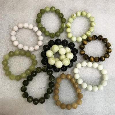 Vòng chuỗi hạt ngọc thật màu vàng cho người mệnh Thủy và Kim đường kính hột là 10 li (1cm)