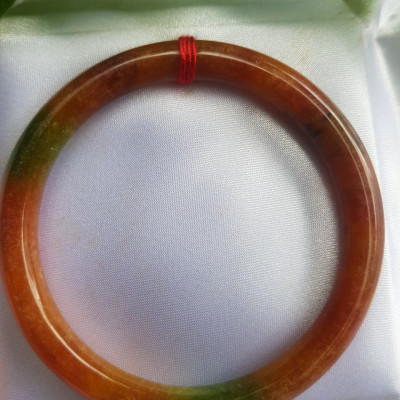 Vòng Mã Não Tứ Quý đỏ xanh bông Ni 55mm chột 7mm nặng 54kg đến 62kg đeo đẹp sẽ giúp cho bạn trông thật nổi bật và thu hút mọi ánh nhìn xung quanh đấy ạ