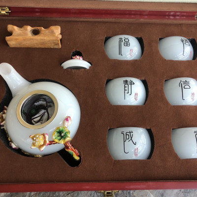 Bộ ấm trà chạm bông hoa sen
