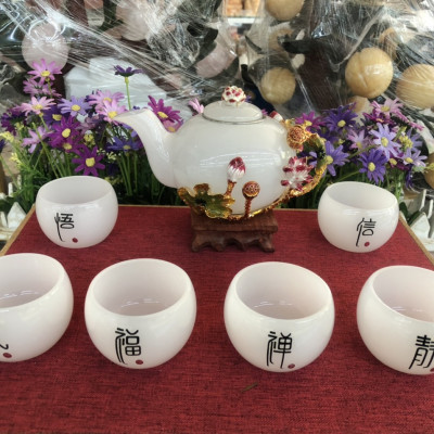 Bộ ấm trà chạm bông hoa sen