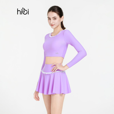 Áo bơi nữ Hibi Sports SS013 - Kiểu croptop tay dài, cổ nhún bèo trắng, kèm mút