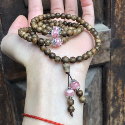 Vòng Tay Trầm Hương phối Đá Đào Hoa cùng charm bạc thái - bình an, may mắn, tài lộc